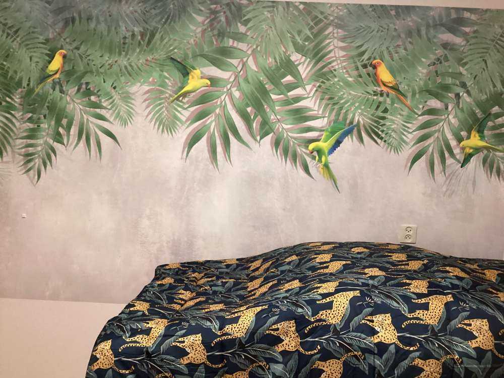 Tropiske blader og parakitter