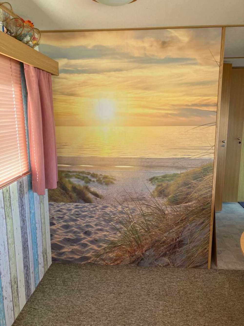 Solnedgang på sanddynestranden