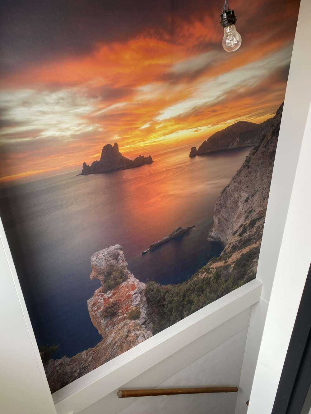 Soloppgang fra en hule