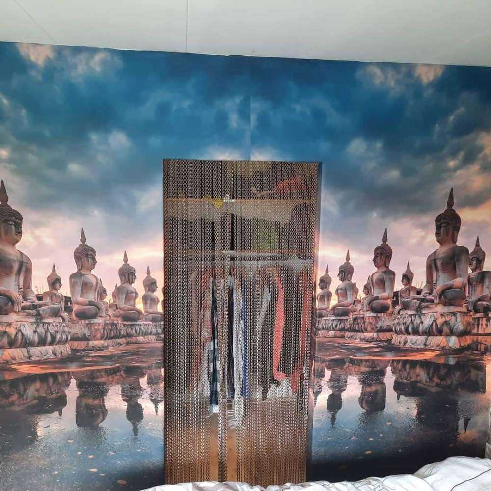 Buddha statyer på vatten