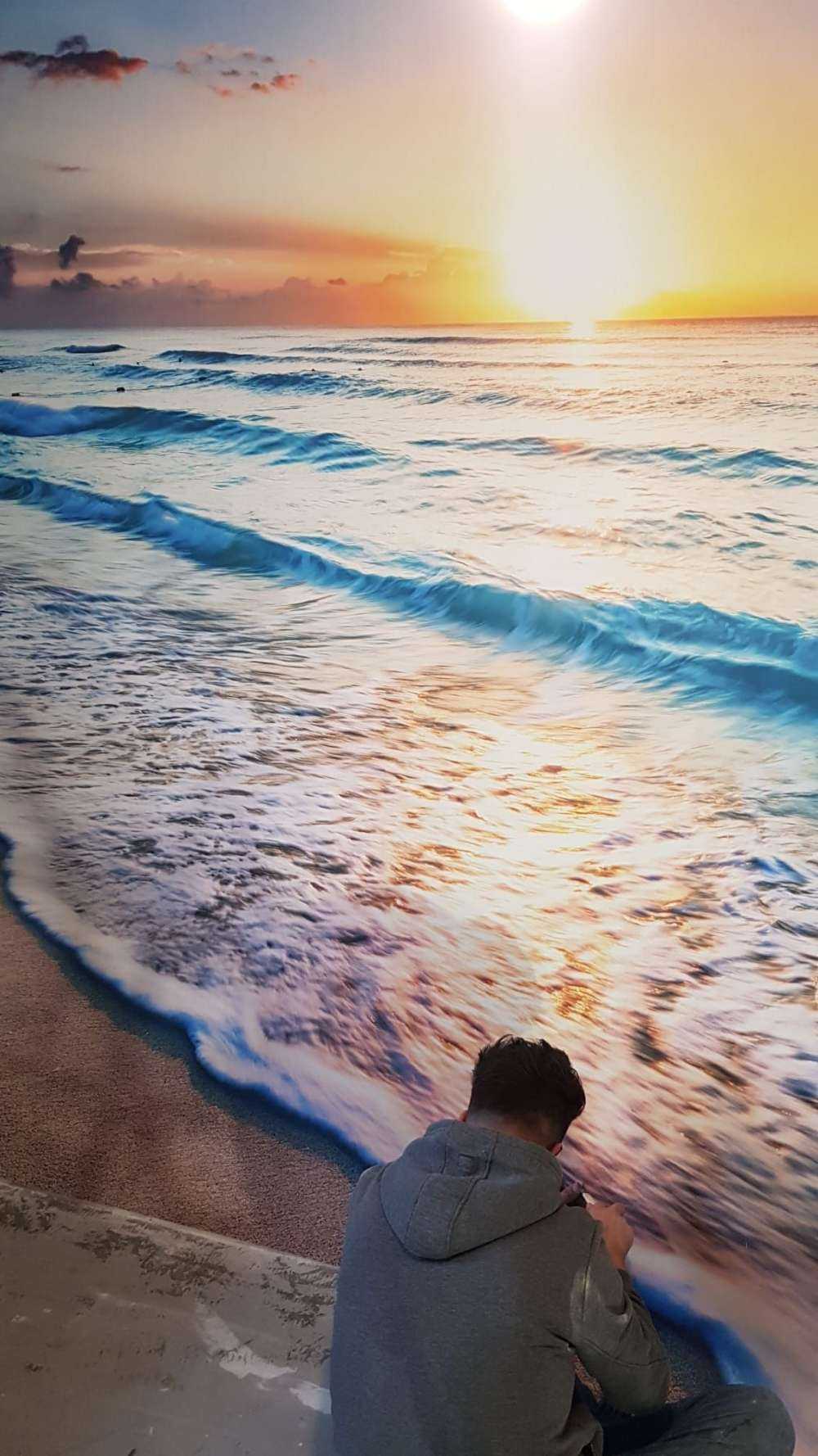 Zonsondergang boven zee