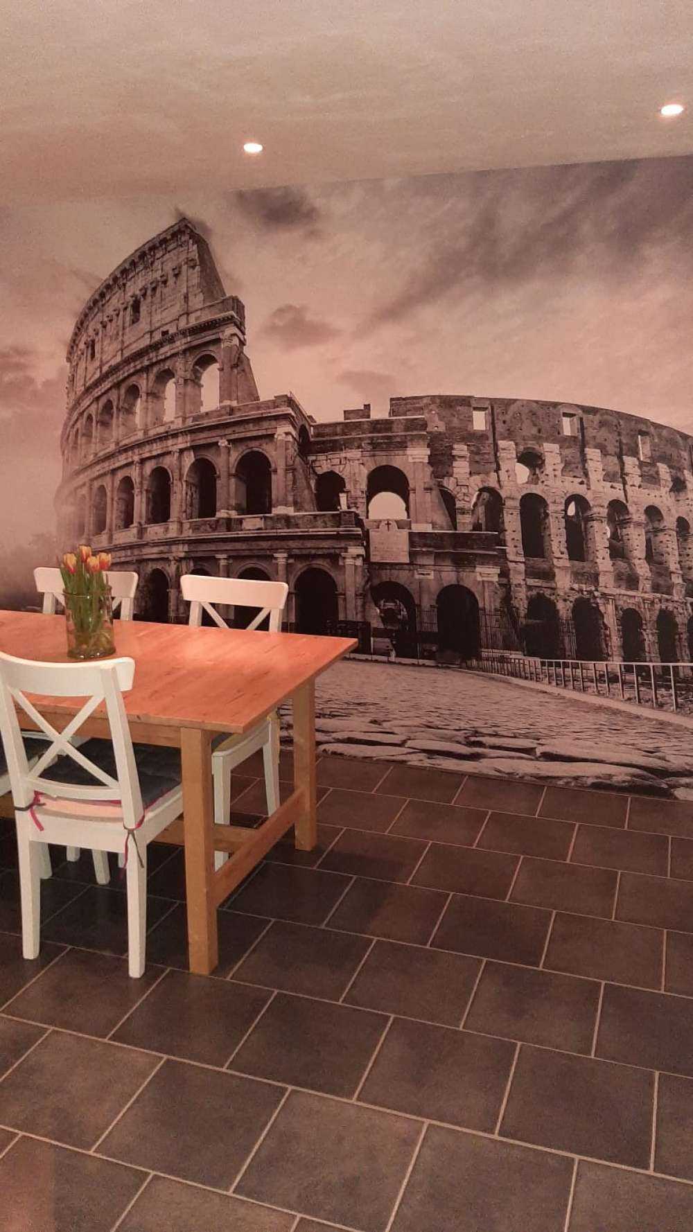 Soloppgang ved Colosseum