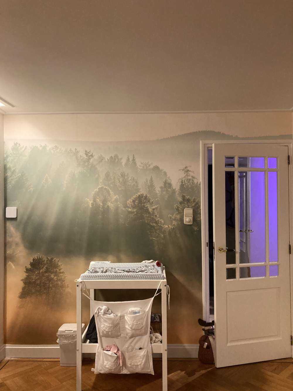 Soloppgang mellom åsene