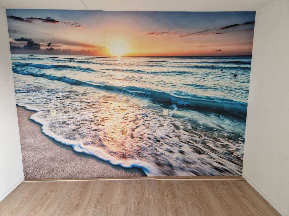 Zonsondergang boven zee