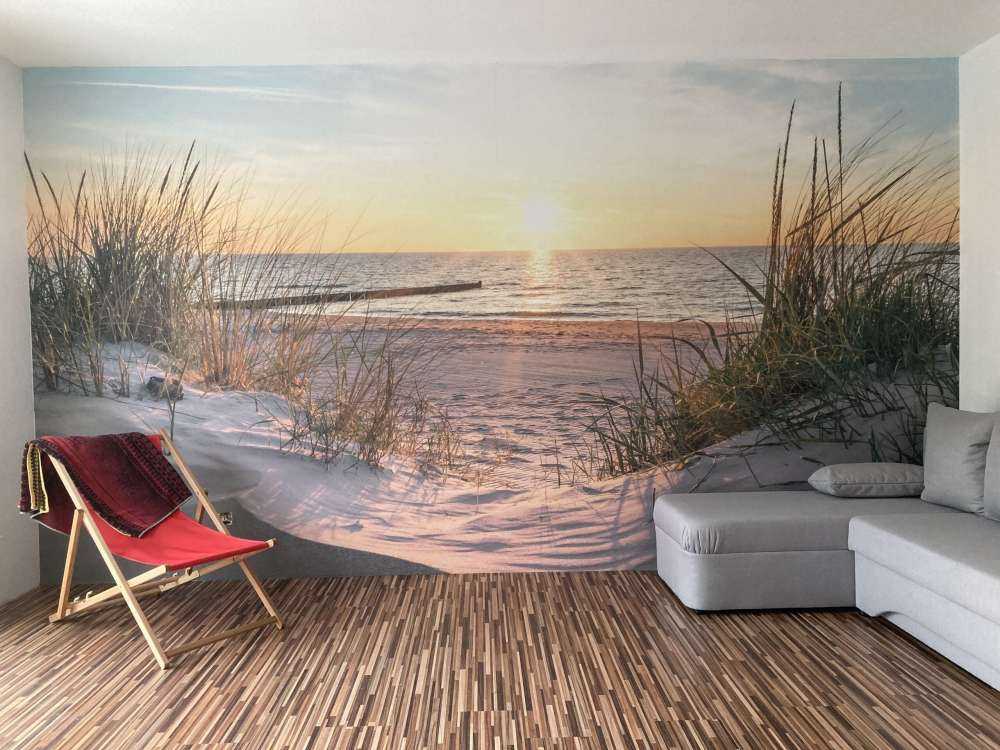 Klitstrand med solnedgang