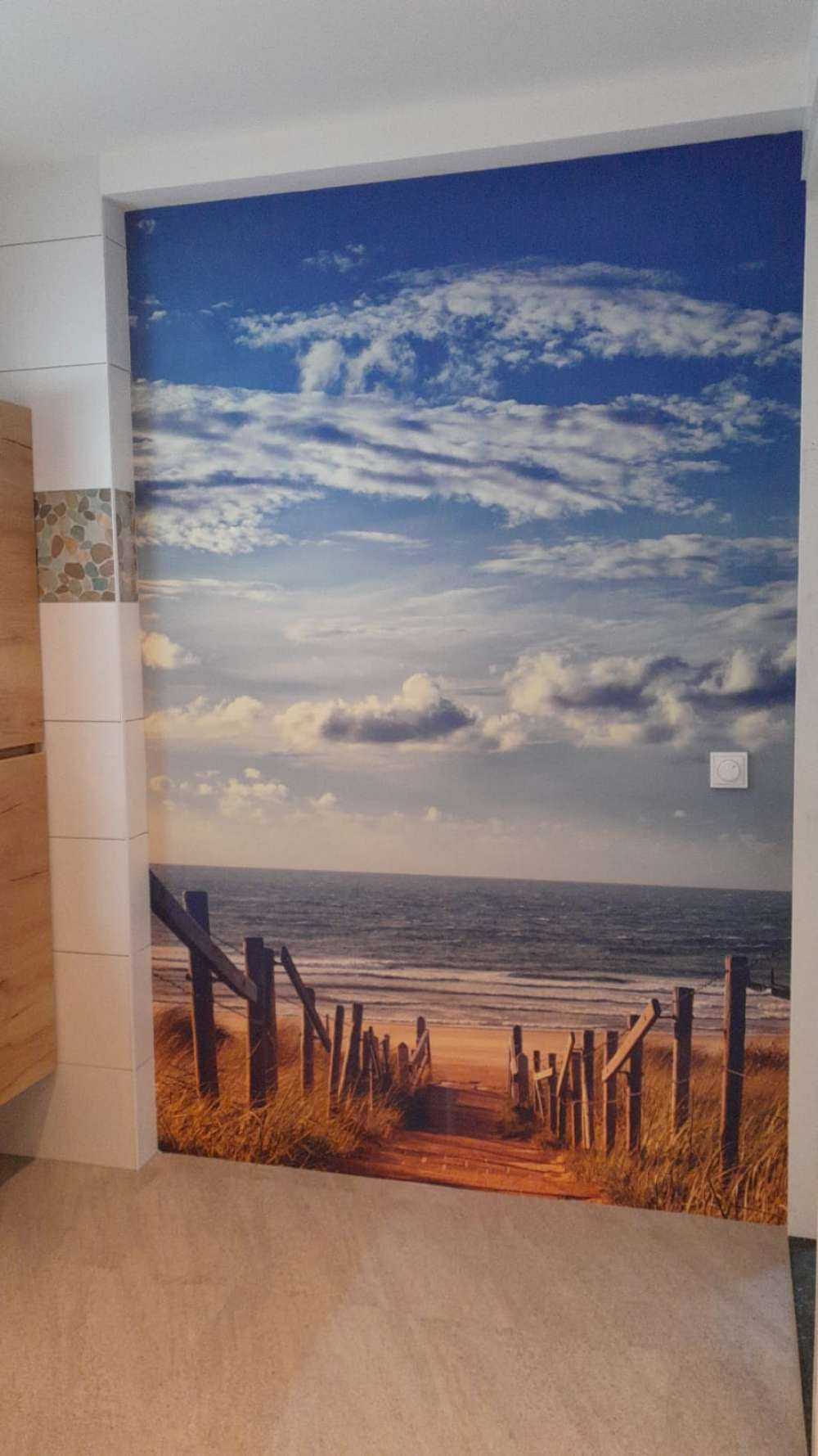 Strand og skyer