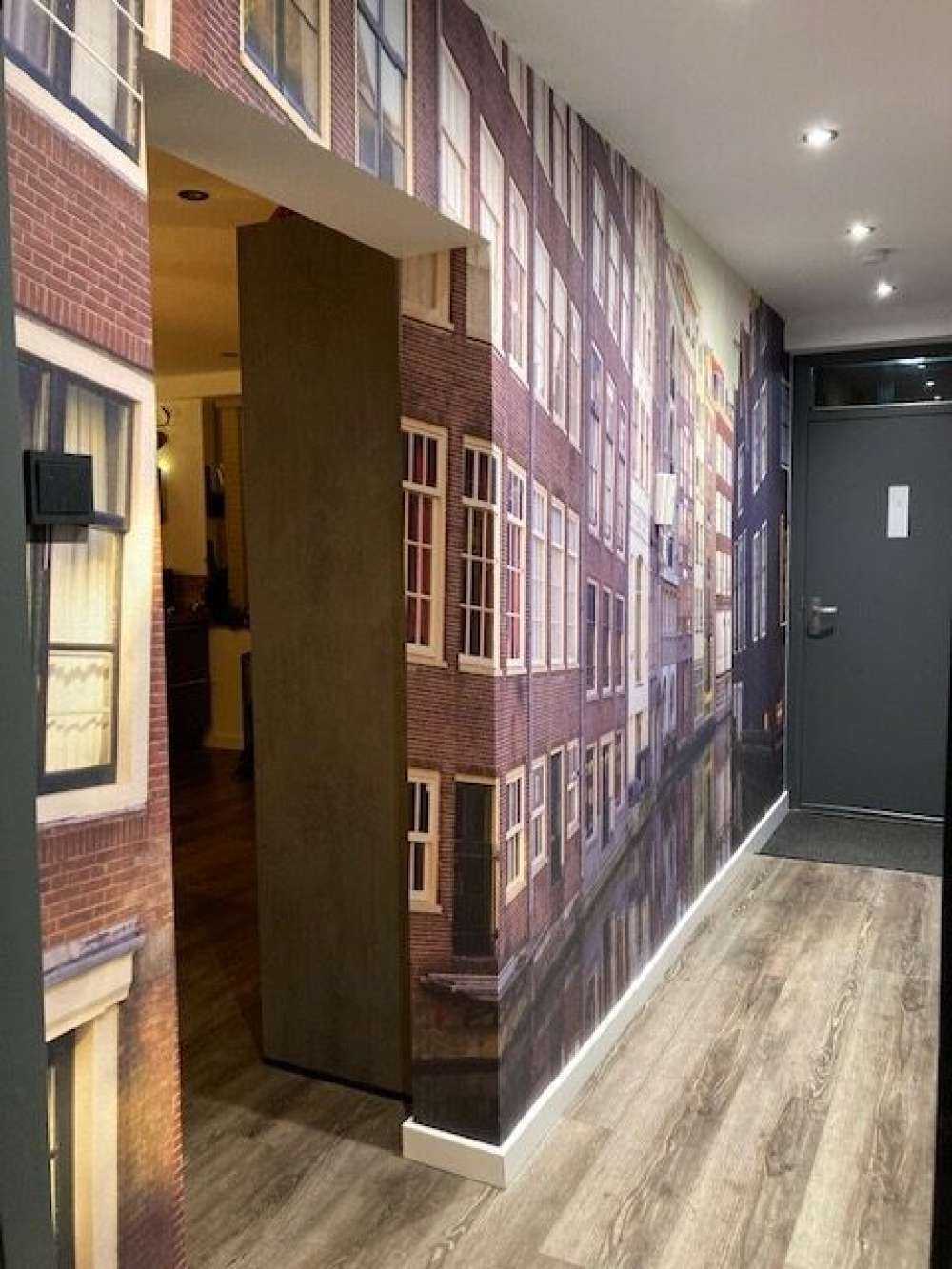 Amsterdam hus på kanalen