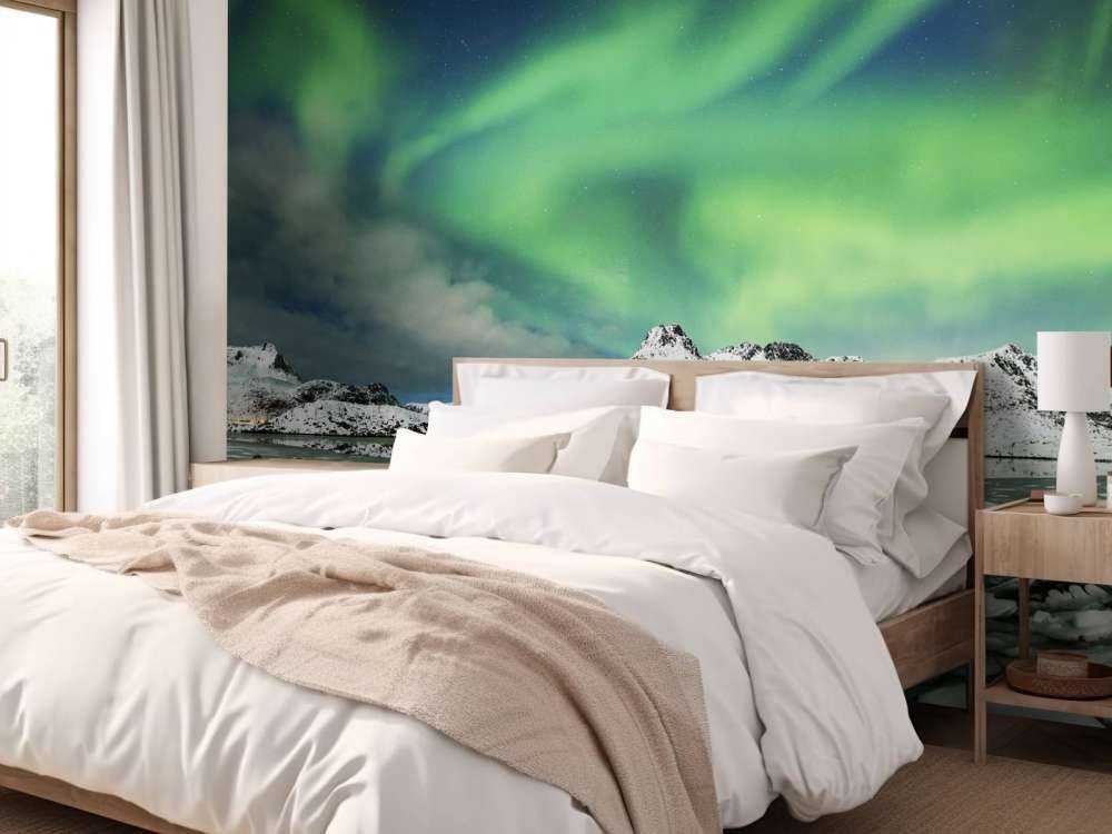 Norrsken över vinterlandskap