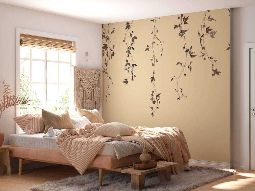 Klematis kvistar på beige