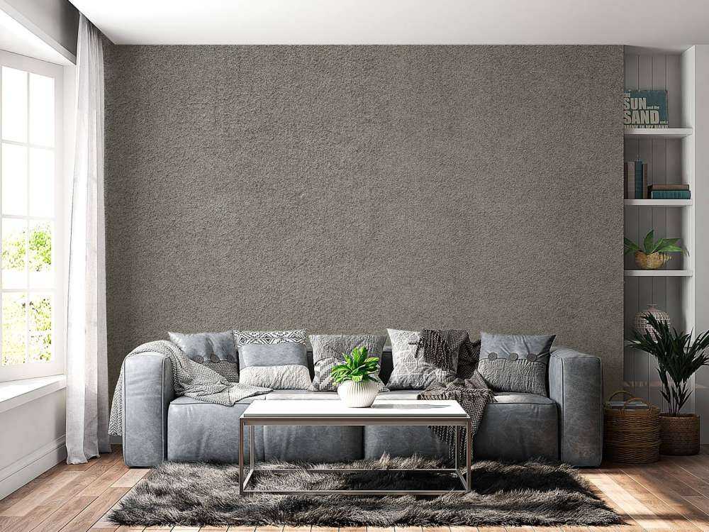 Betongvegg med fine steiner