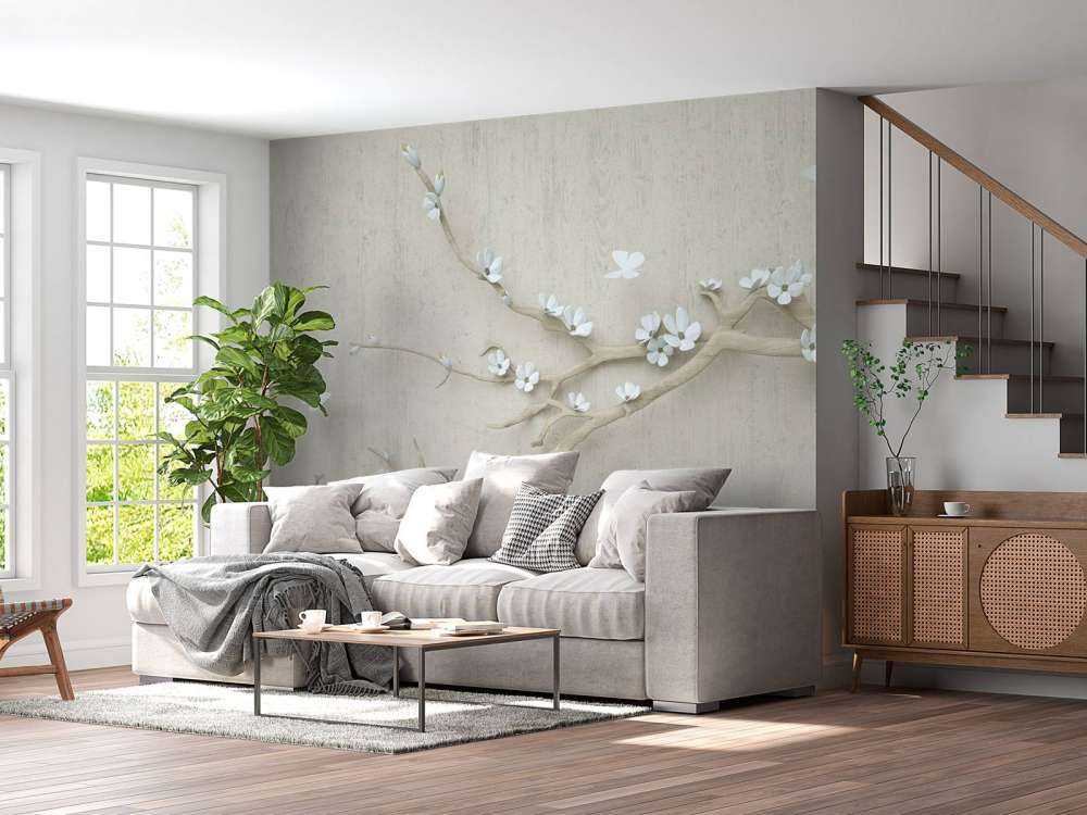 Gren med vita blommor på träbakgrund