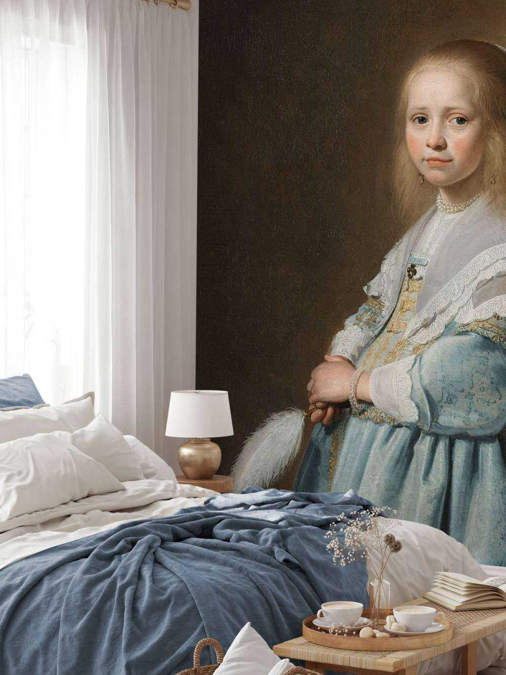 Porträtt av en flicka i blått