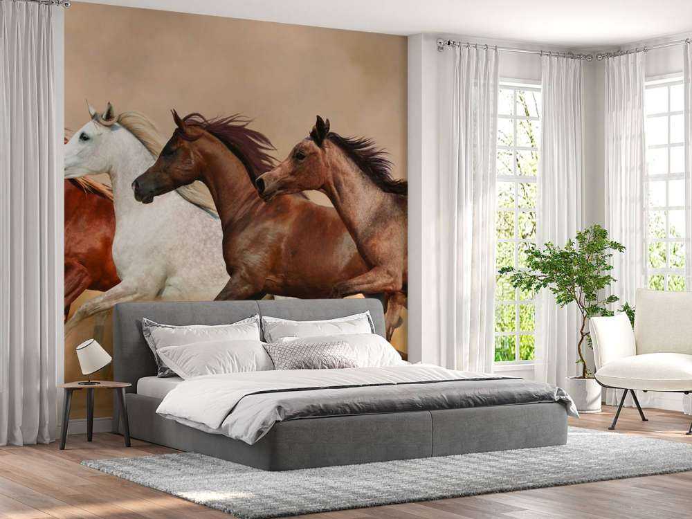 Galopperende hester i en sandstorm