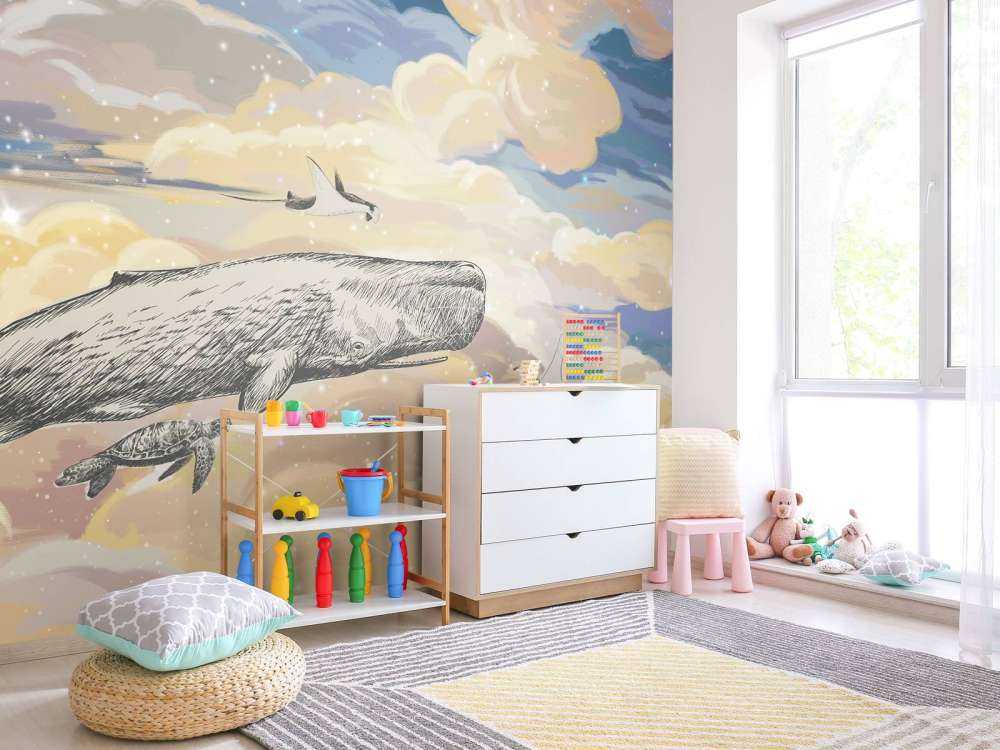 Hval svømmer gjennom skyene