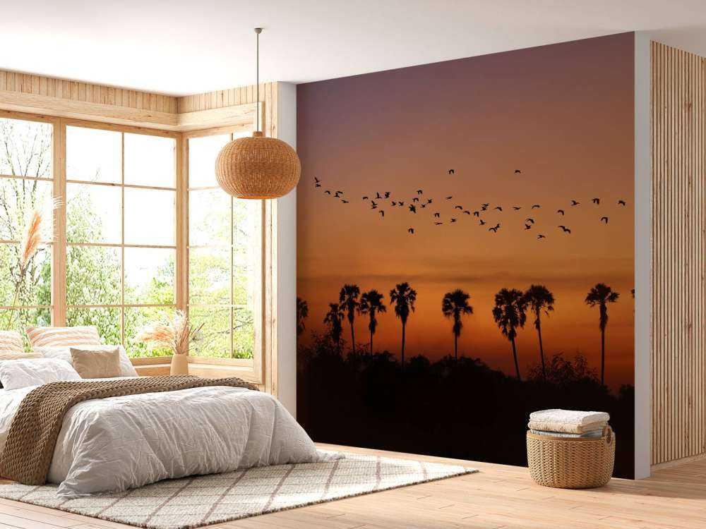 Palmer med gruppe fugler