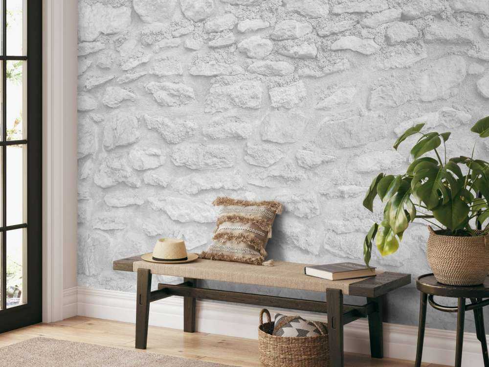 Ljus vägg med grova tegelstenar