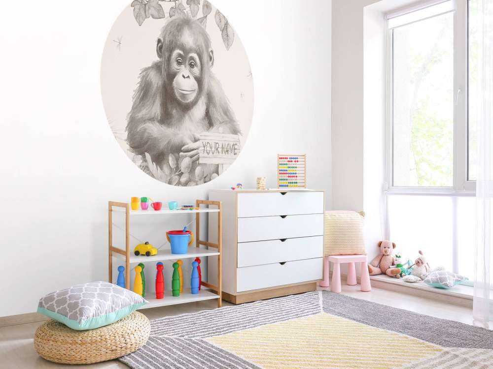 Orangutangunge i djungeln beige