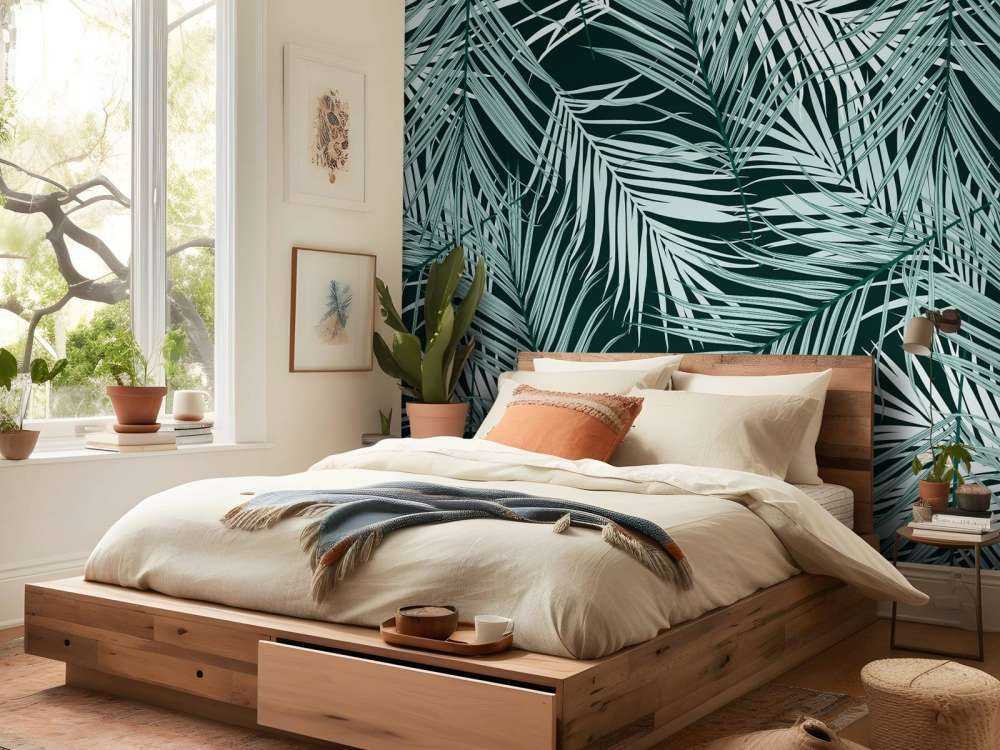 Tropiske blader på en svart bakgrunn