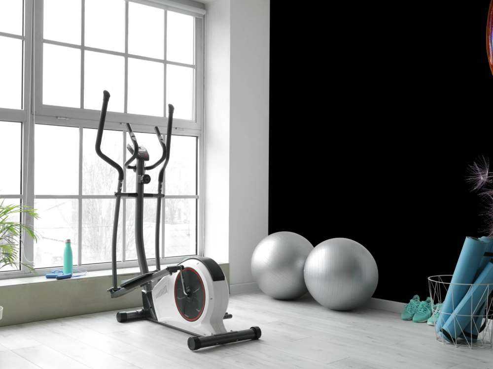 Blå sommerfugl på en løvetann