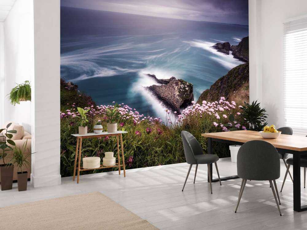 På kanten af __klippen