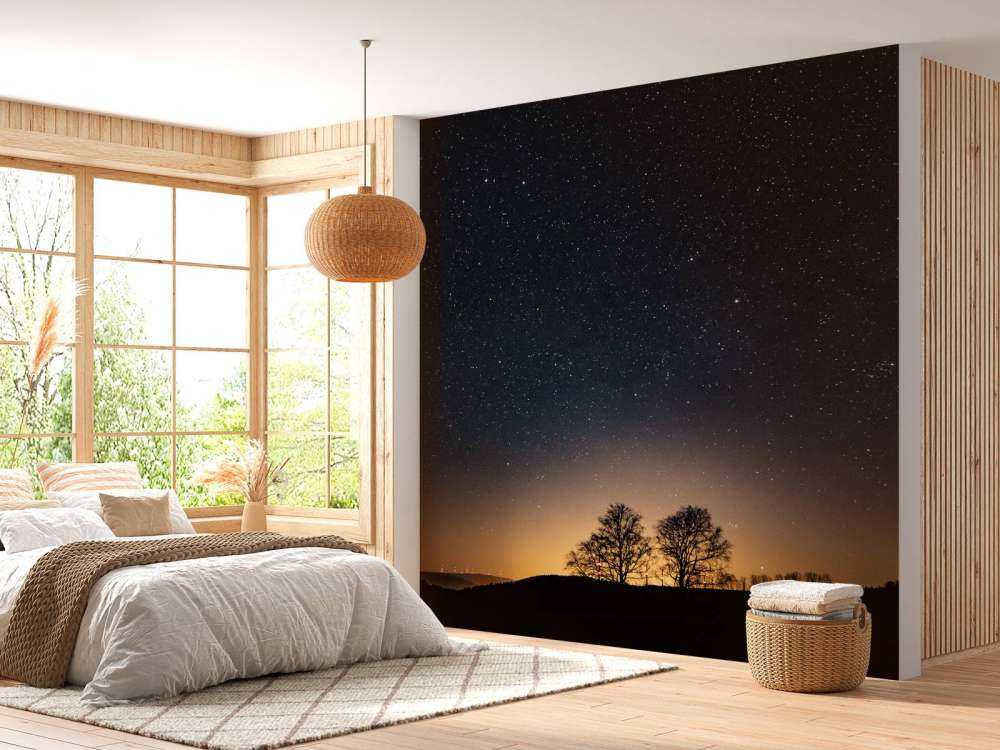 Solnedgang med stjerner