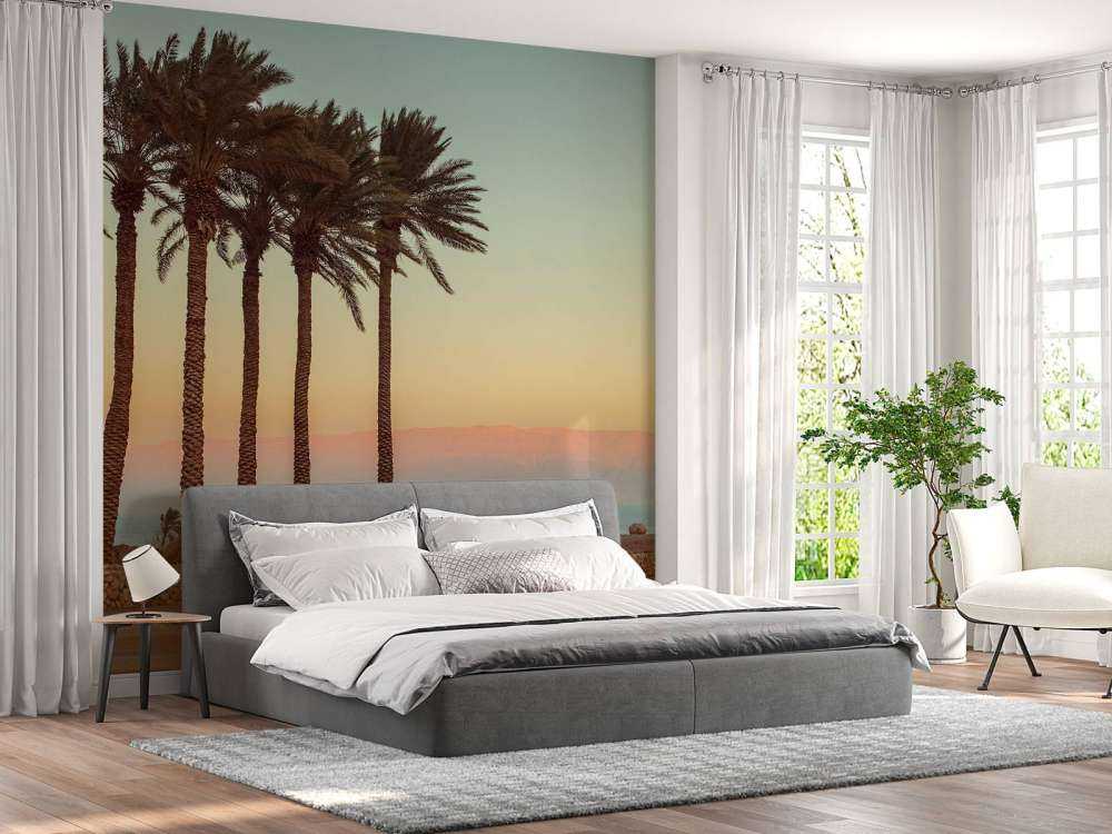 Palmetræer ved solnedgang