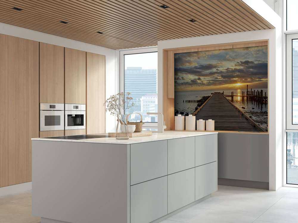 Trebrygge med soloppgang