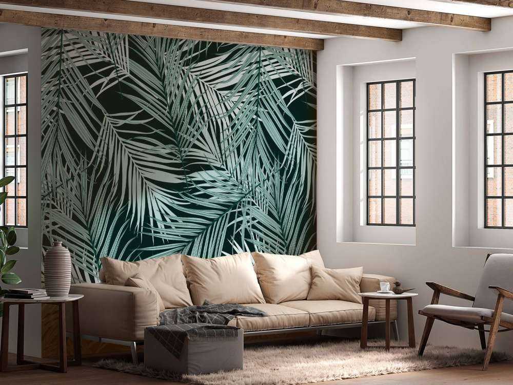 Tropiska blad på svart bakgrund