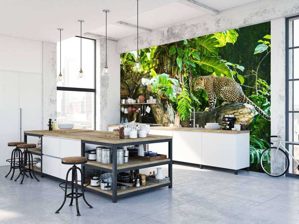 Leopard på en gren