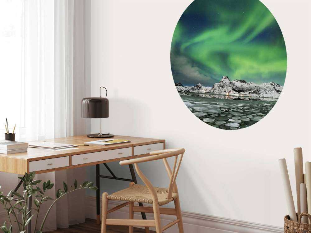 Nordlys over vinterlandskapet