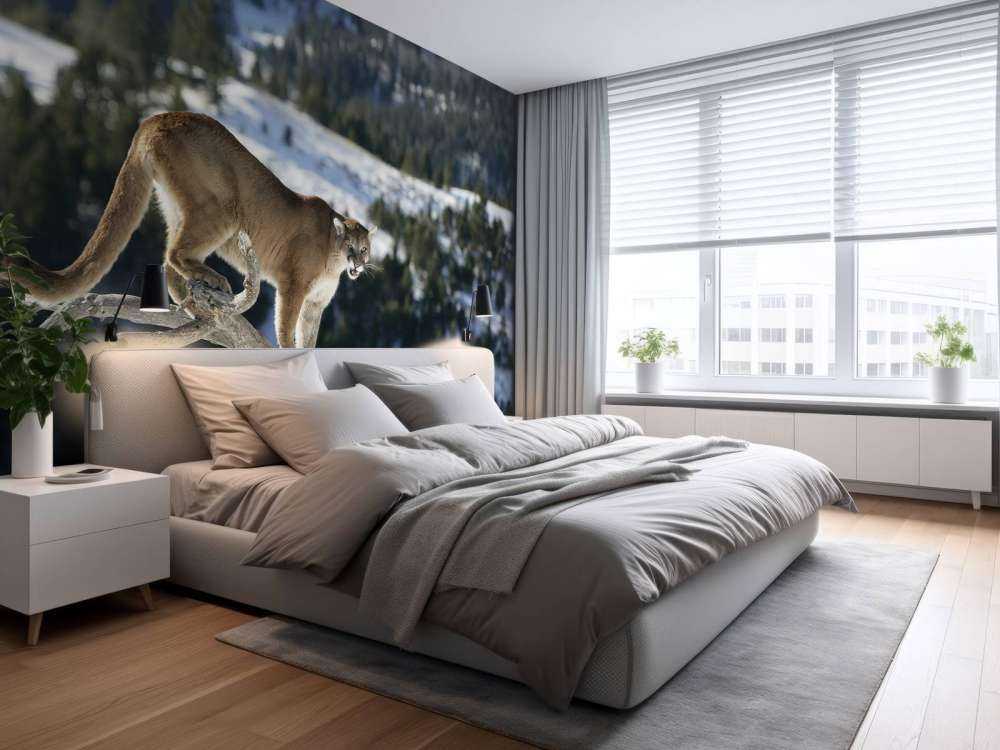 Fjelløve på et dødt tre