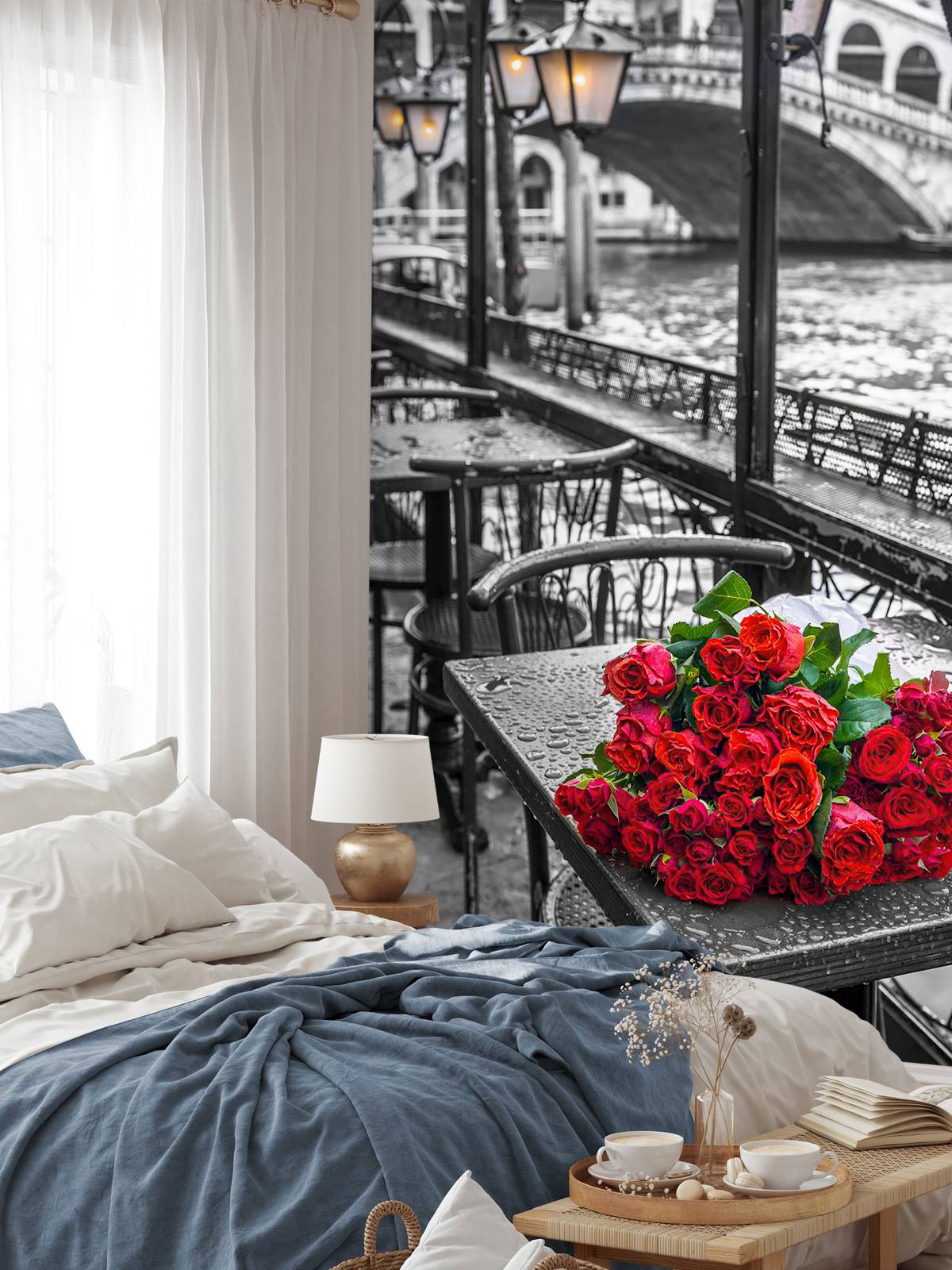 Bunch of red roses on street cafe table, Rialto Bridge, Venice, Italy
