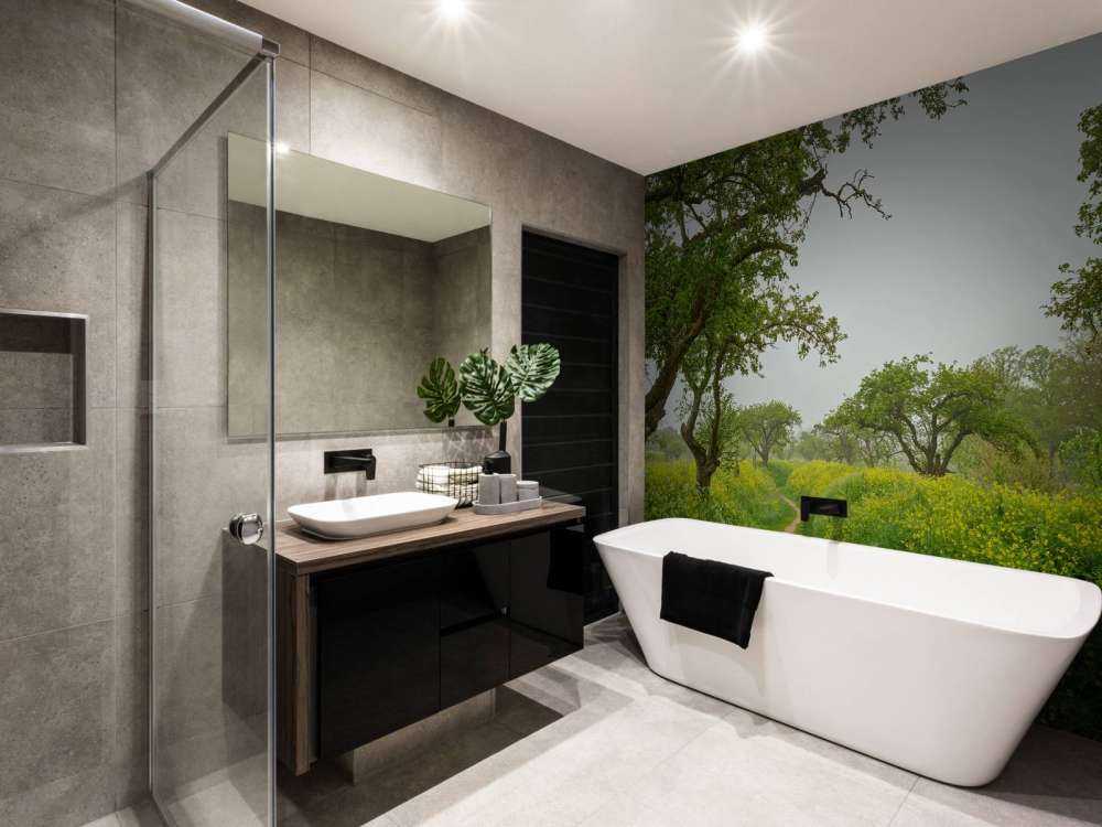 Stigen mellan kullar med gula blommor