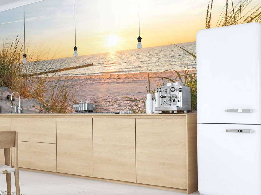 Klitstrand med solnedgang