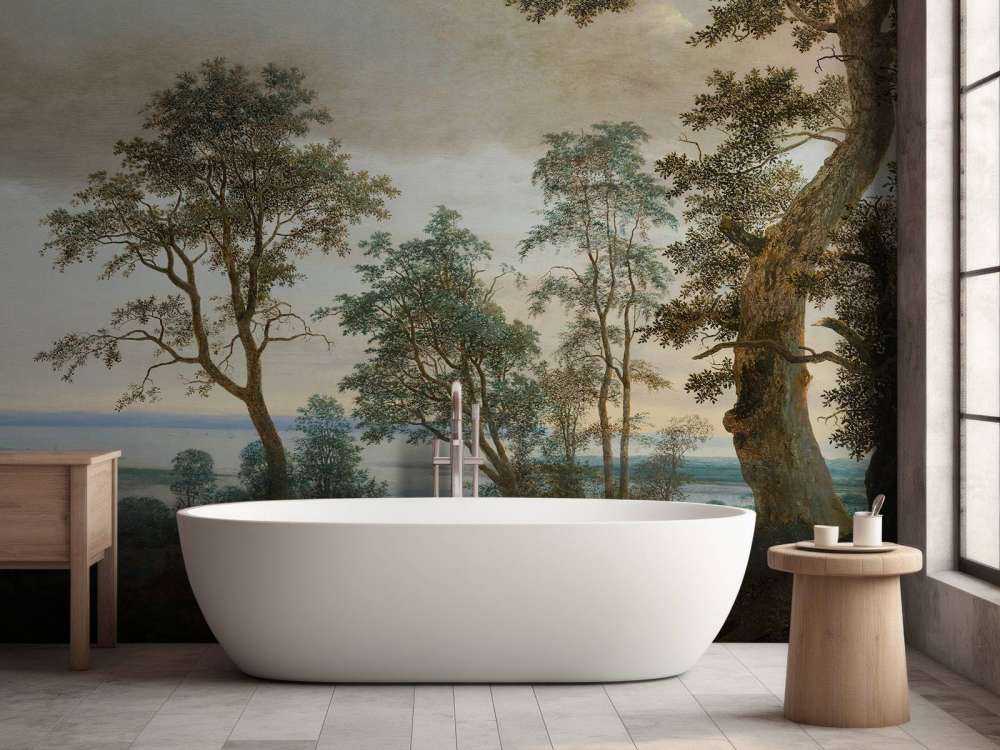 Flodlandskab set gennem træer