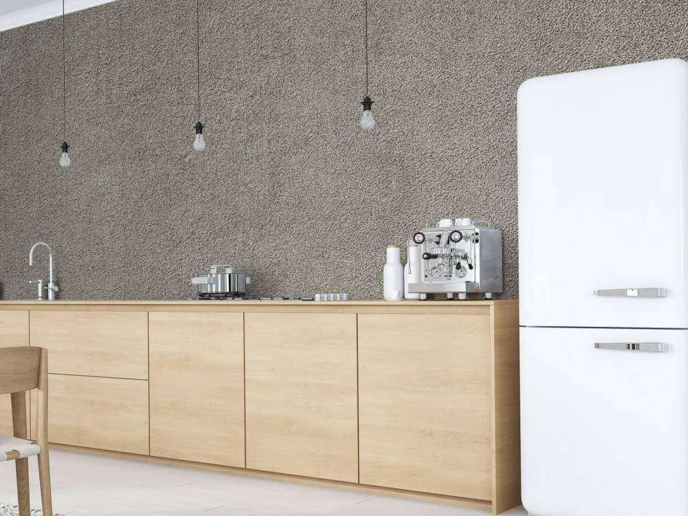 Betongvegg med fine steiner