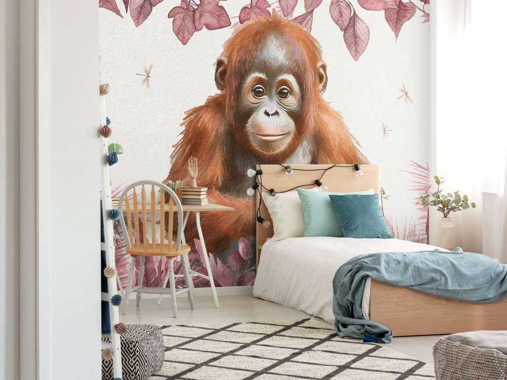 Ung orangutang i den lyserøde jungle