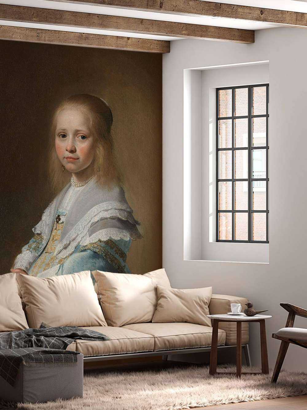 Porträtt av en flicka i blått