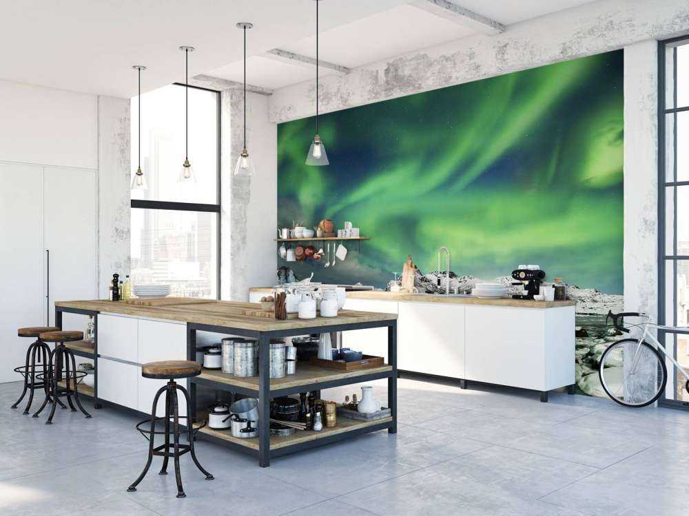 Norrsken över vinterlandskap