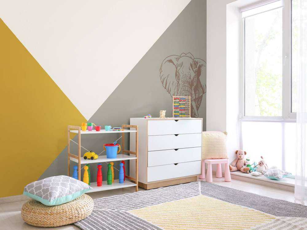 Trekanter i okkergult og grønt med elefant