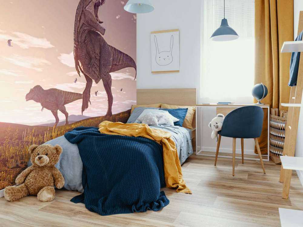Två Tyrannosaurier i ett fält
