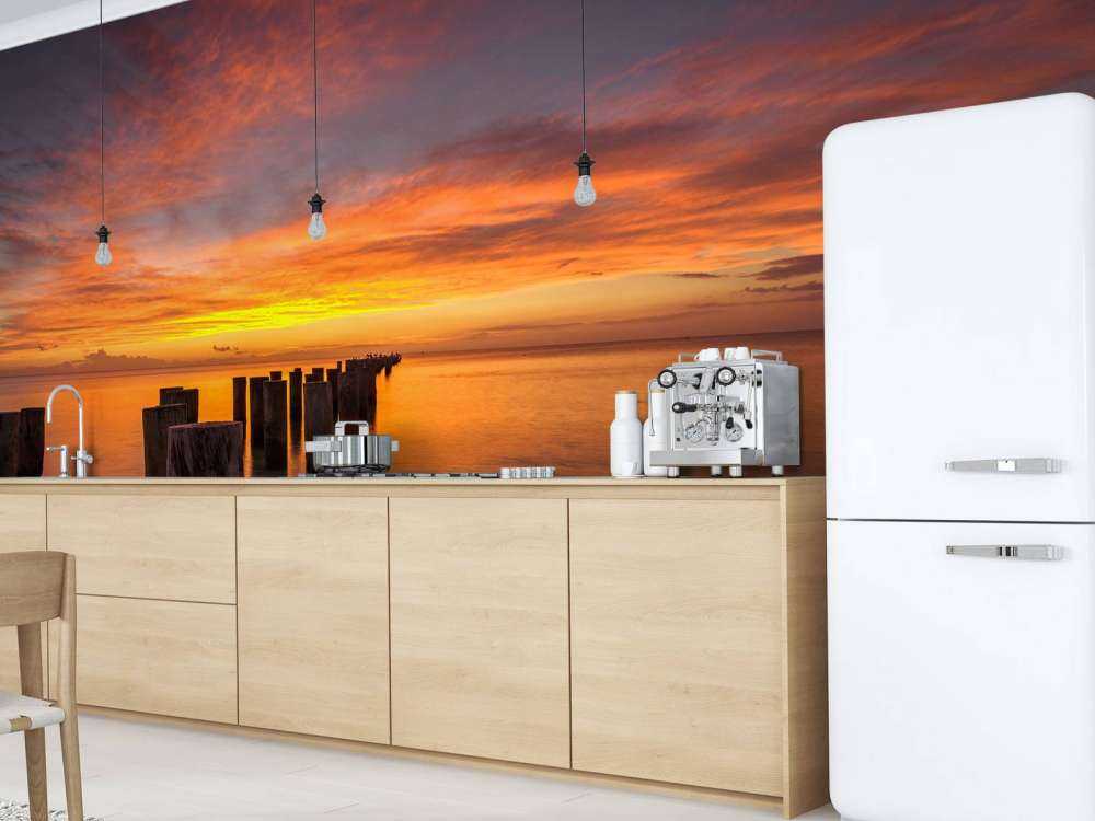 Vågor vid soluppgång