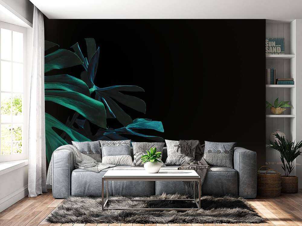 Tropiska löv på svart bakgrund