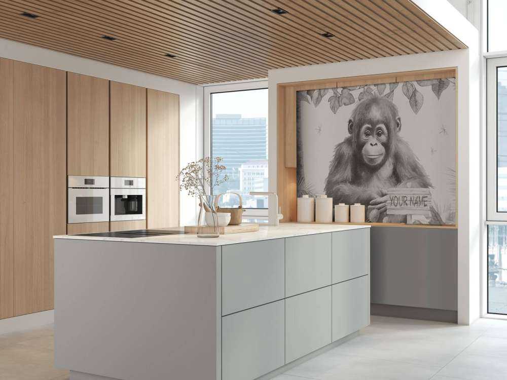 Orangutangunge i djungeln beige