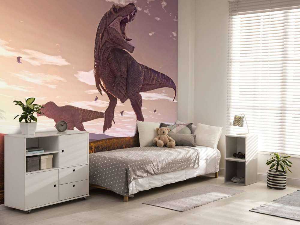 To tyrannosaurer på en mark