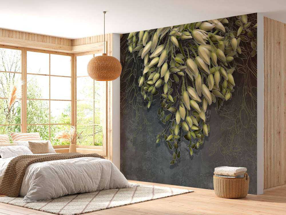 Hvite blomster kalyxer på en mørk grå betongkonstruksjon