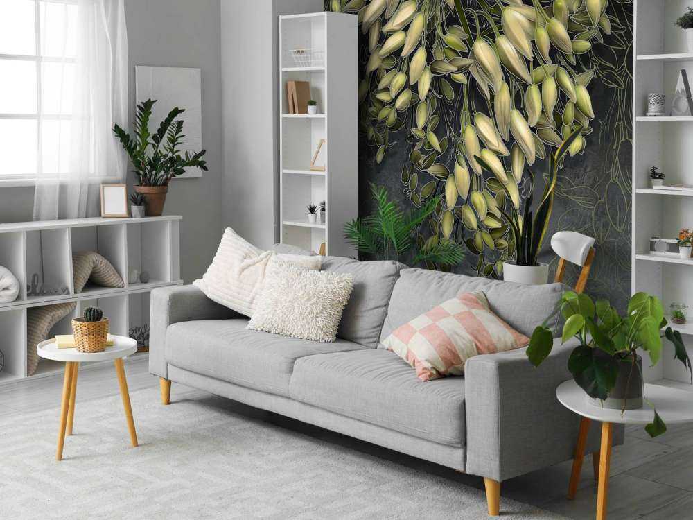 Hvite blomster kalyxer på en mørk grå betongkonstruksjon