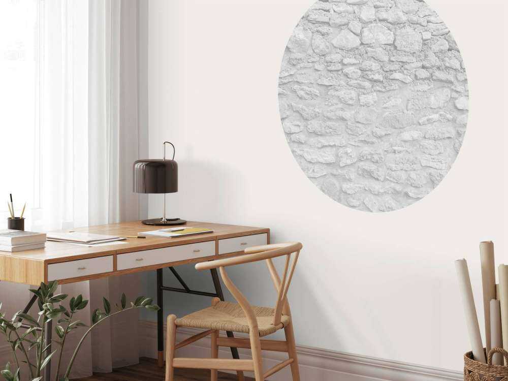 Ljus vägg med grova tegelstenar