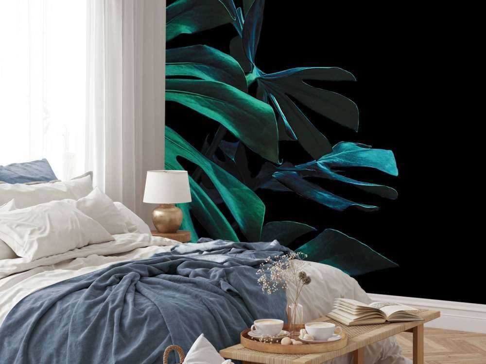 Tropiska löv på svart bakgrund