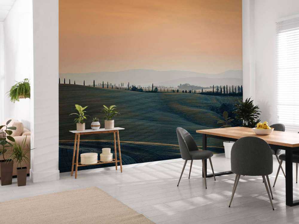 Oransje glød over italiensk landskap